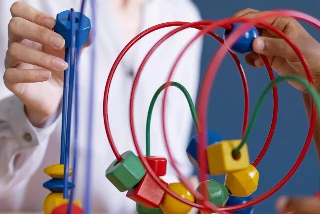 little-boy-having-an-occupational-therapy-session-with-psychologist